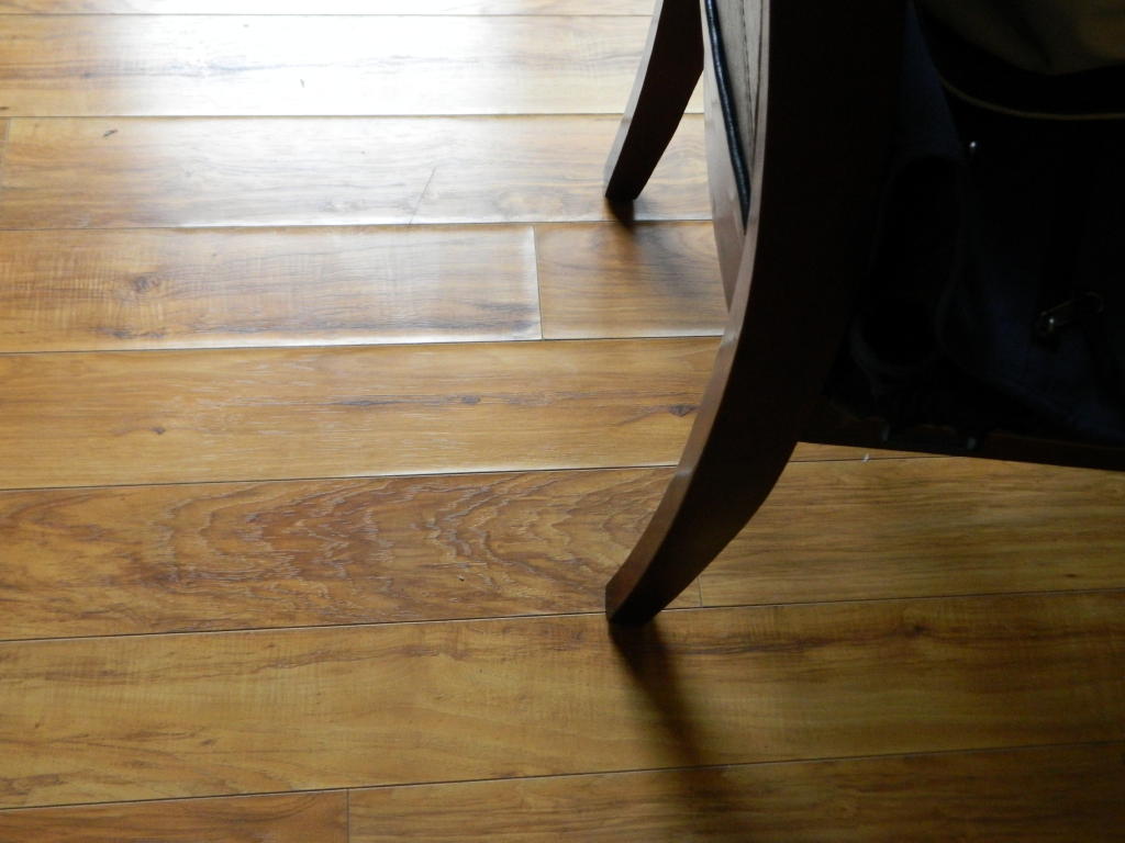 Swelling bubbling in laminates and hardwood floors causes & solutions